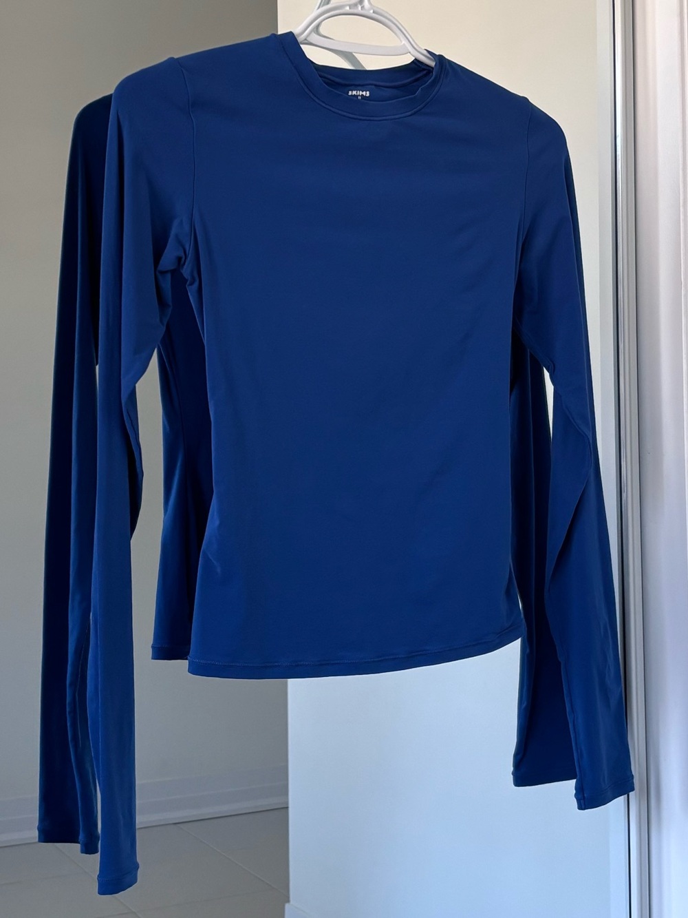 SKIMS Fits Everybody Long Sleeve T-Shirt in Sapphire Blue - Picture 2 of 7
